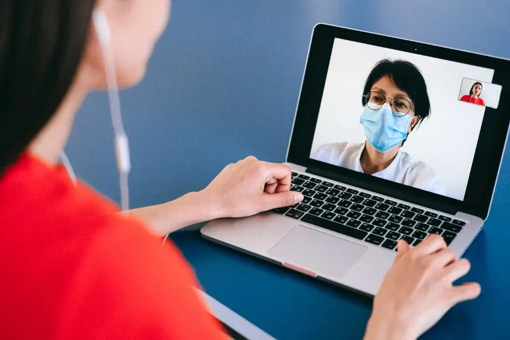 Patient on a secure video visit with a healthcare provider